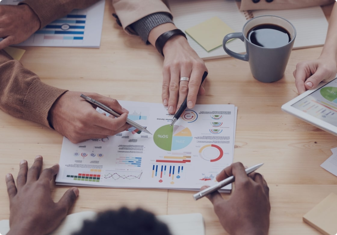 Advisors reviewing performance charts and analytics